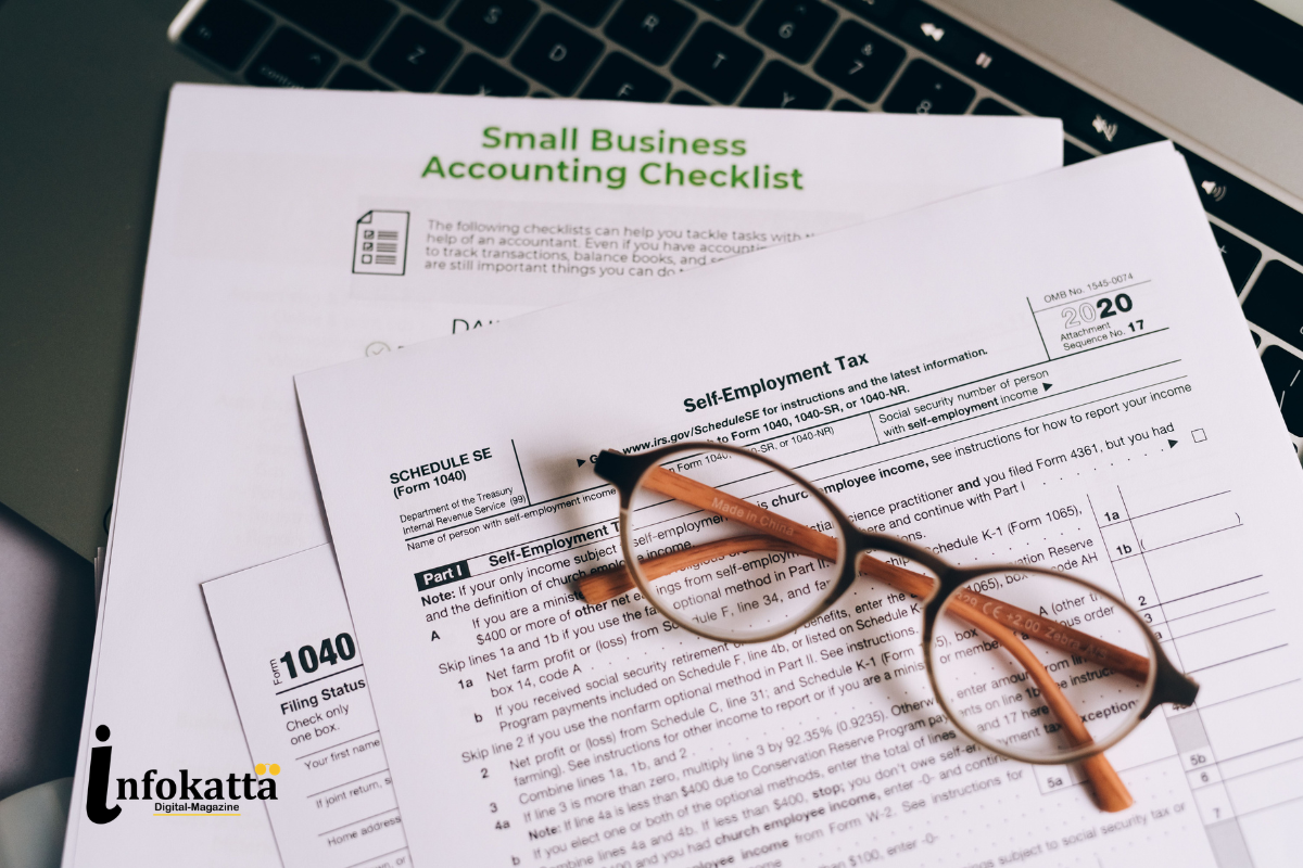 Small business owner reviewing invoices and calculating cash flow